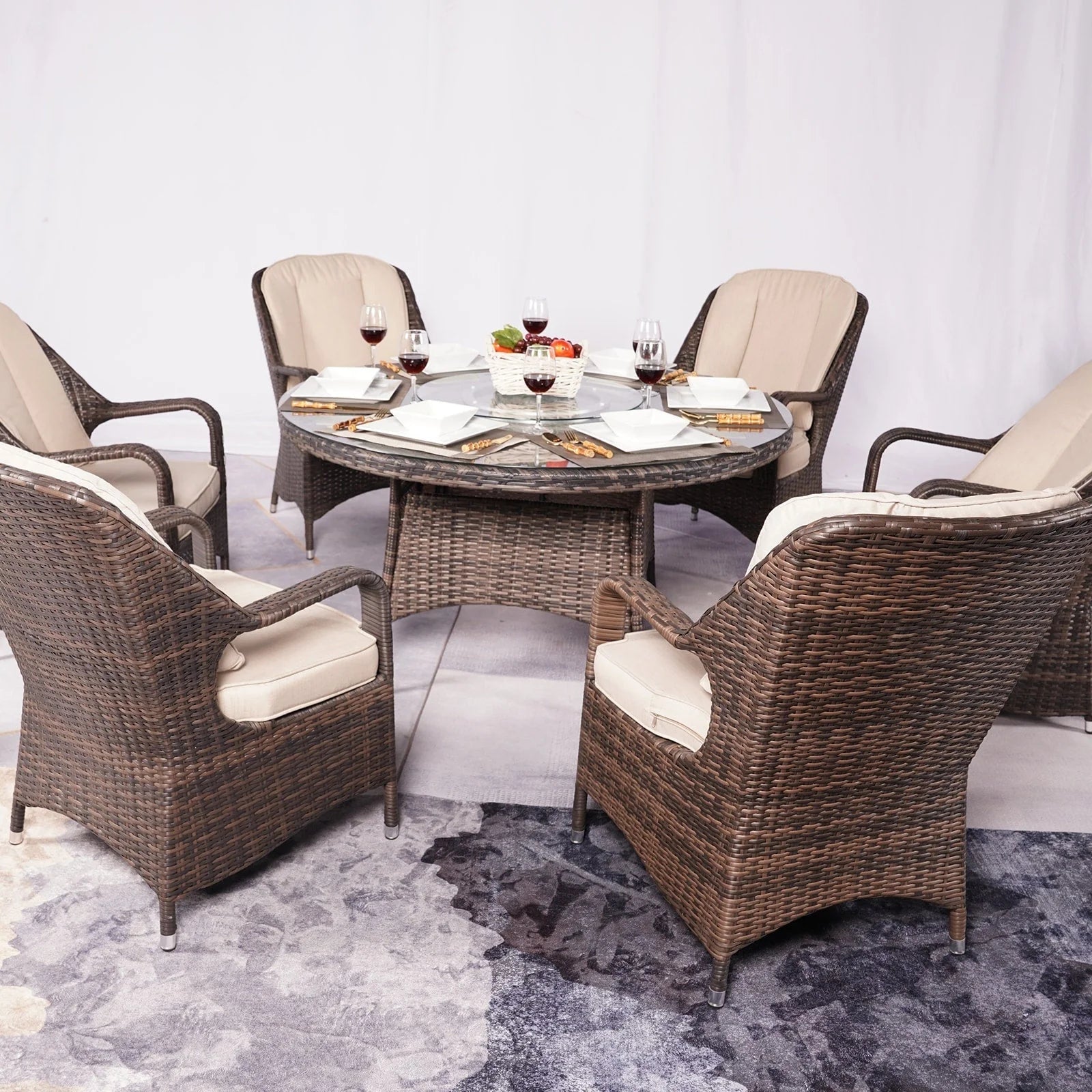Ensemble de salle à manger rond 7 pièces en rotin tressé d'extérieur avec coussins de Moda Furnishings