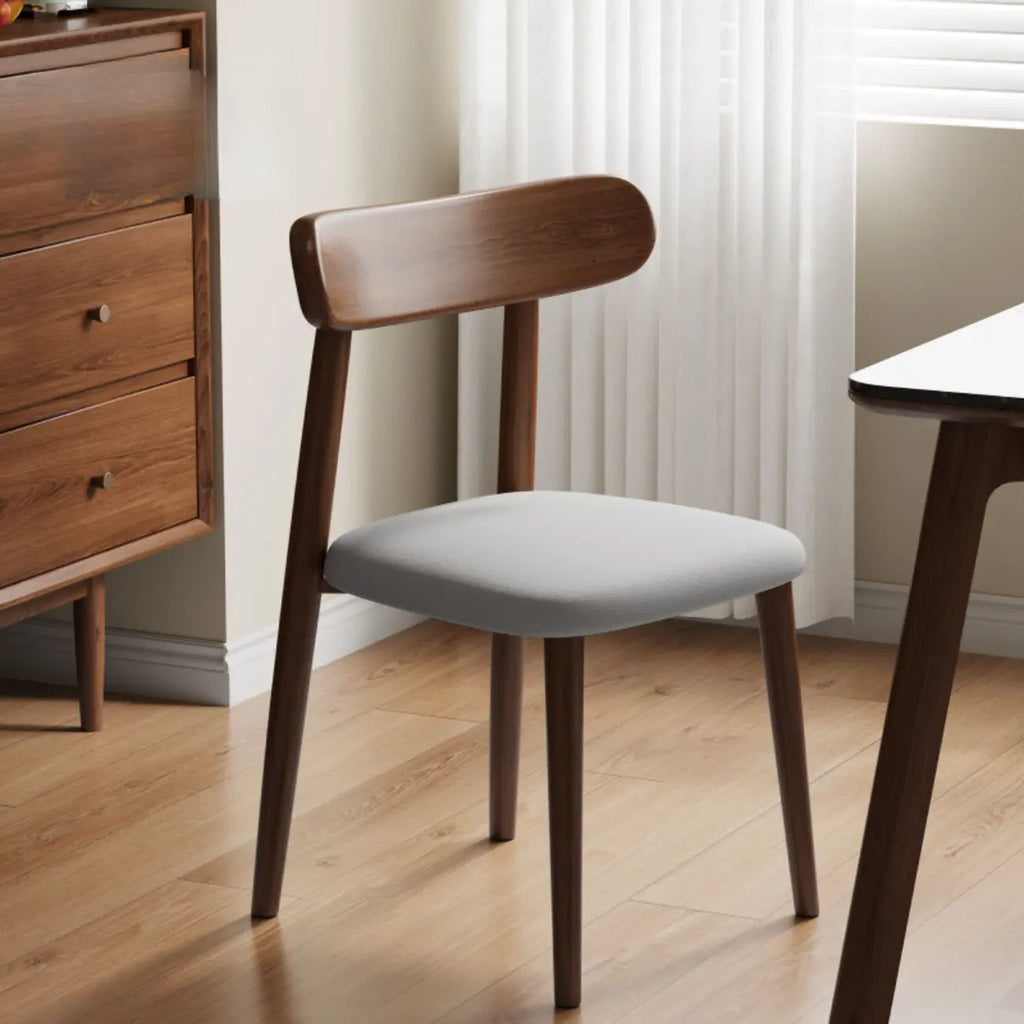 Chaise de salle à manger moderne en cuir sans accoudoirs avec dossier bas