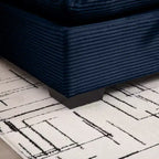 Canapé d'angle confortable en velours côtelé avec oreillers et accoudoirs ronds, canapé-lit moderne profond avec pouf de rangement