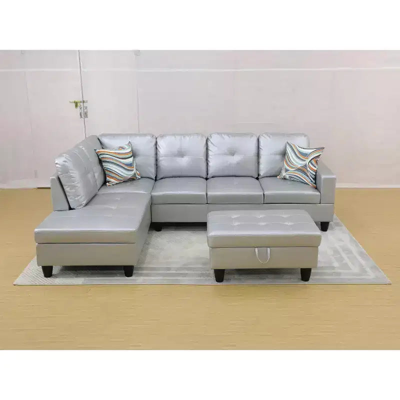Canapé d'angle moderne en cuir gris avec pouf de rangement