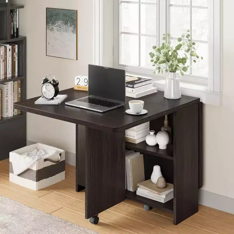 Table de salle à manger pliable et compacte pour 4 personnes avec abattant, 2 étagères de rangement et 6 roulettes pour une mobilité facile