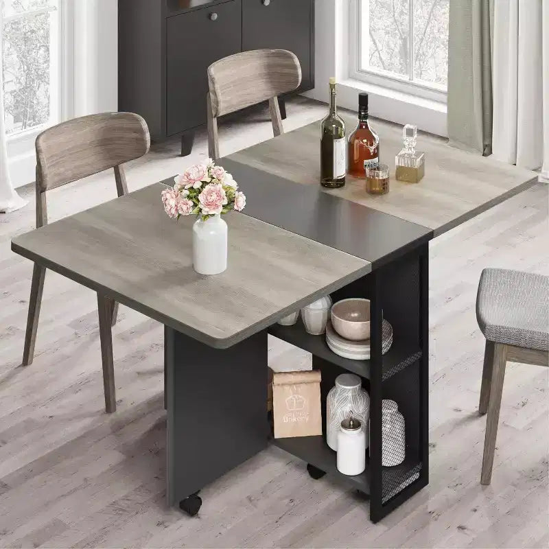 Space-Saving Foldable Dining Table for 4 with Drop Leaf, 2 Storage Shelves, and 6 Wheels for Easy Mobility