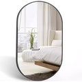 Miroir ovale en métal doré 20 x 28 pouces