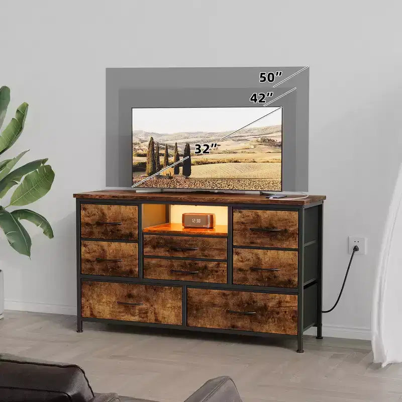 Meuble TV commode avec prise de courant et lumières LED pour téléviseur de 55", centre de divertissement à 8 tiroirs, commode en tissu avec plateau en bois, noir