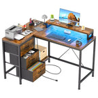 Bureau d'ordinateur de 43 pouces, bureau en L avec prises de courant et lumières LED, bureau de jeu à 3 tiroirs avec étagères de rangement et support d'écran