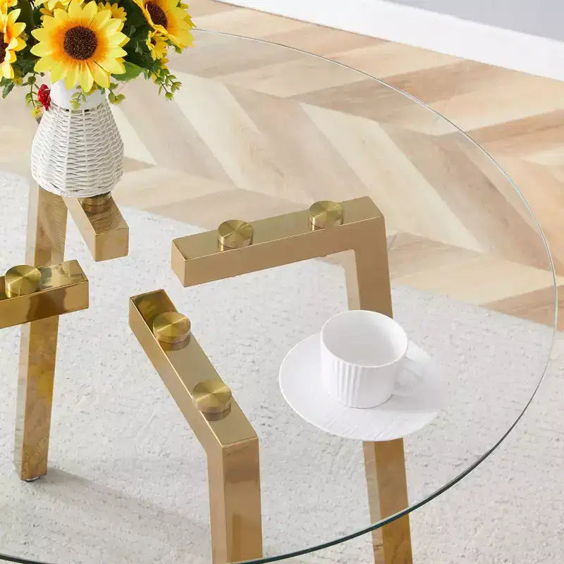 Table à manger ronde de luxe moderne Okak avec plateau en verre et pieds en métal pour salle à manger