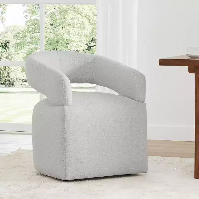 Chaise de salle à manger moderne Spruce&Spring avec roulettes et dossier ajouré