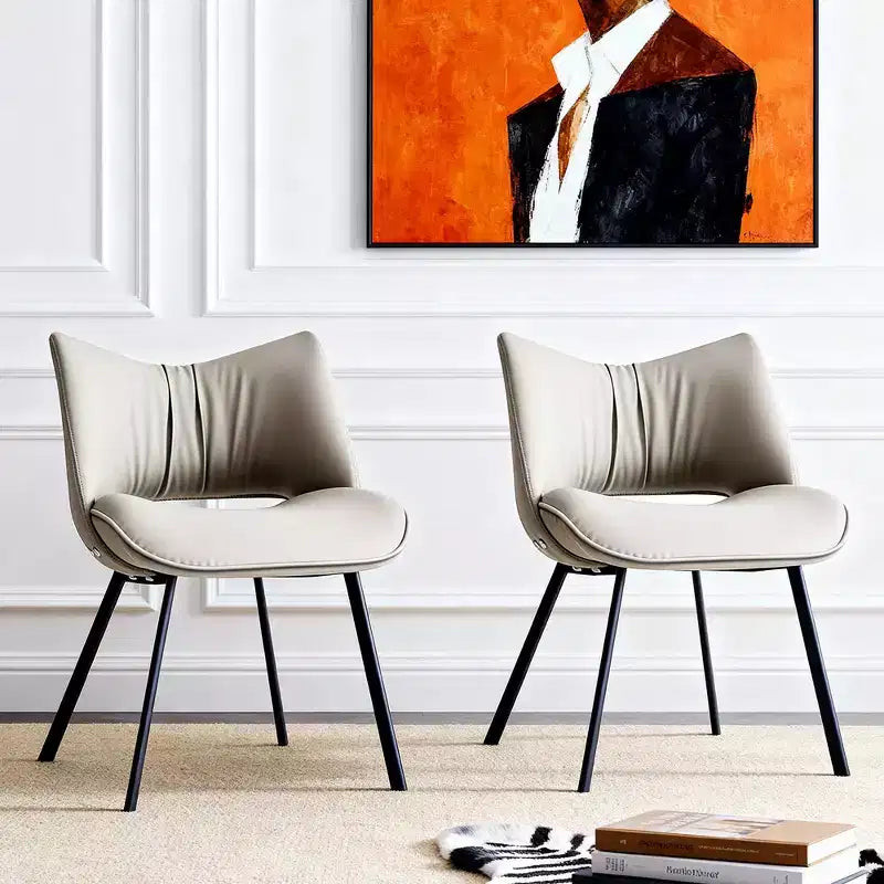 Chaise de salle à manger chic et moderne Gaoyangjiaju avec dossier incurvé et pieds en métal noir - Gris clair