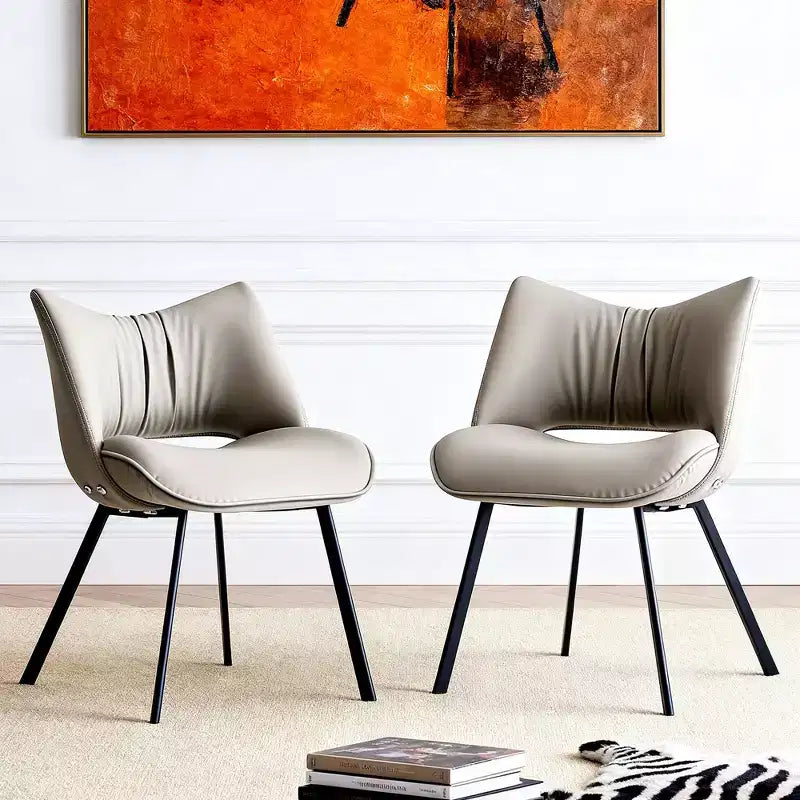 Chaise de salle à manger chic et moderne Gaoyangjiaju avec dossier incurvé et pieds en métal noir - Gris clair