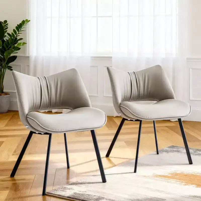 Chaise de salle à manger chic et moderne Gaoyangjiaju avec dossier incurvé et pieds en métal noir - Gris clair