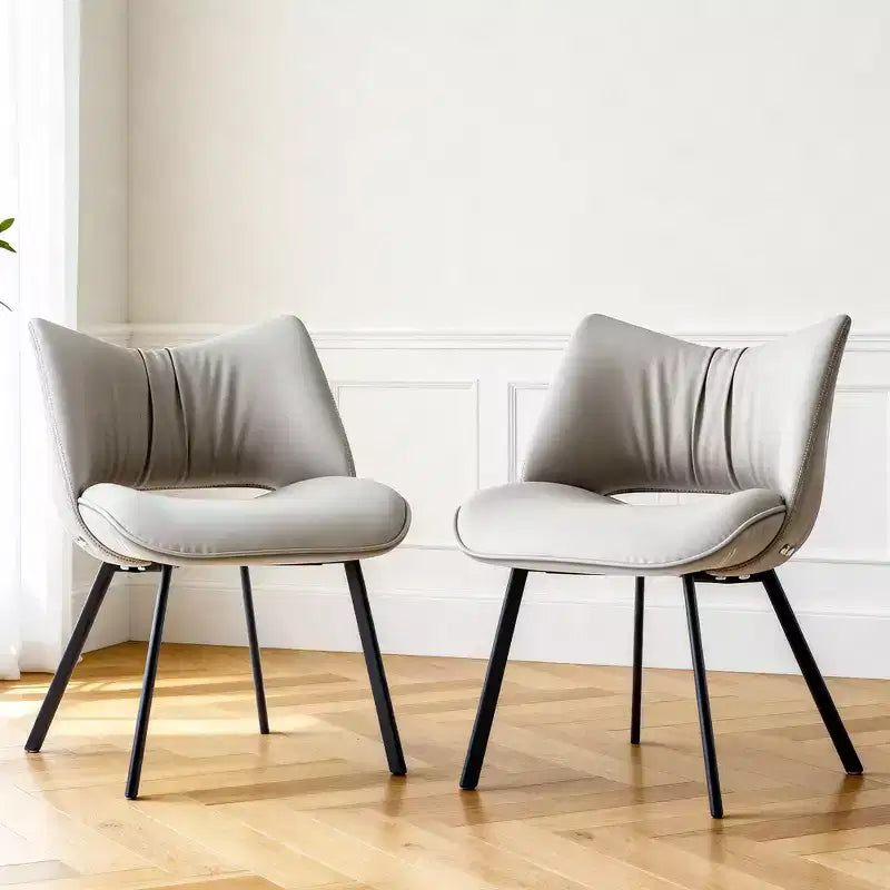 Chaise de salle à manger chic et moderne Gaoyangjiaju avec dossier incurvé et pieds en métal noir - Gris clair