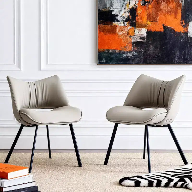 Chaise de salle à manger chic et moderne Gaoyangjiaju avec dossier incurvé et pieds en métal noir - Gris clair