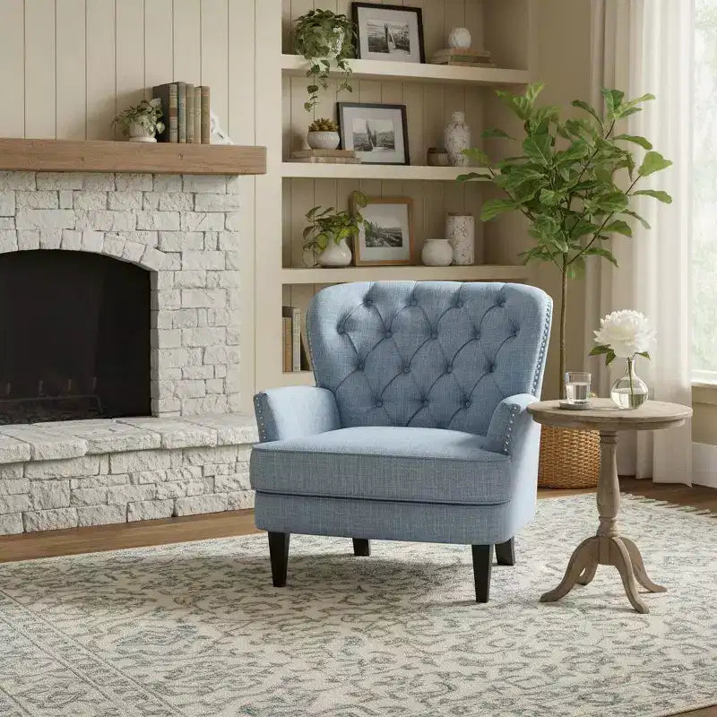 Fauteuil de relaxation touffeté Polibi avec dossier incurvé et clous décoratifs
