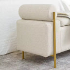 Banc de rangement capitonné élégant EHMKNP en lin avec accoudoirs cylindriques et pieds en fer