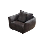 Fauteuil capitonné noir 44 avec oreillers et coussin large