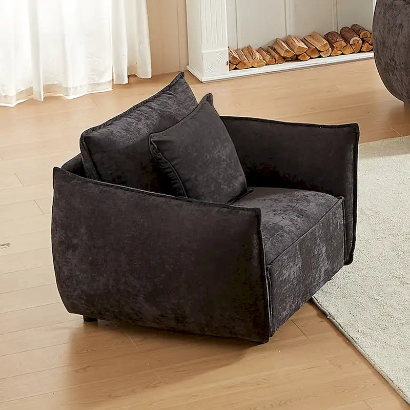 Fauteuil capitonné noir 44 avec oreillers et coussin large