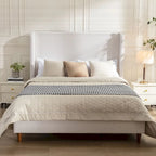 Lit king-size capitonné avec accoudoirs, élégant pour des nuits de rêve