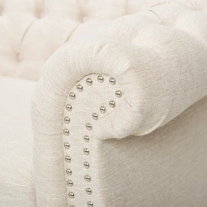 Canapé 3 places capitonné Chesterfield beige avec clous décoratifs