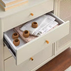Commode à 4 tiroirs et 1 porte en rotin synthétique Lifestorey Bayview, couleur ivoire