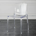 Chaise de salle à manger en acrylique ambré sans accoudoirs et à dossier bas