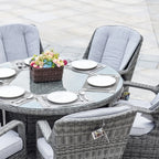 Ensemble de salle à manger rond 7 pièces en rotin tressé d'extérieur avec coussins de Moda Furnishings