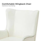 Fauteuil classique Harpocrates à dossier haut et garniture cloutée | ART OF LIVING DESIGNS