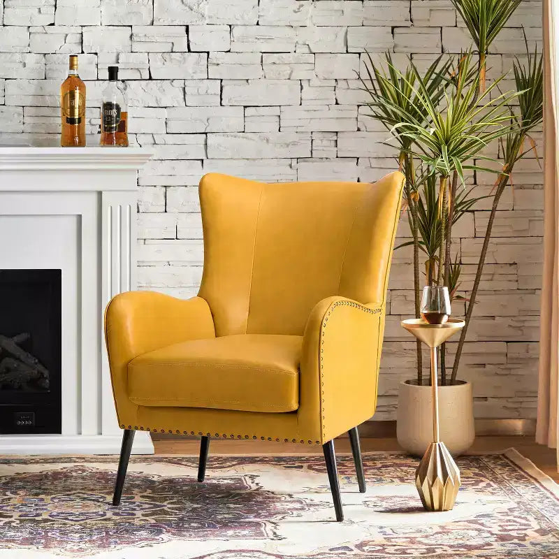 Fauteuil classique Harpocrates à dossier haut et garniture cloutée | ART OF LIVING DESIGNS