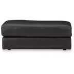 Pouffe en cuir contemporain Amiata Onyx par Signature Design by Ashley