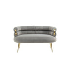 Fauteuil tubulaire long en velours avec pieds dorés