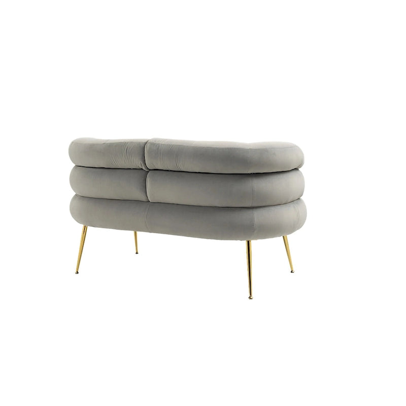 Fauteuil tubulaire long en velours avec pieds dorés