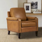 Fauteuil Kunz de transition en cuir véritable avec coussin amovible et clous décoratifs par HULALA HOME