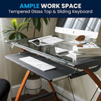 Bureau d'ordinateur moderne avec plateau en verre et tablette coulissante pour clavier