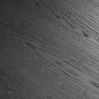Table à manger ronde Dovelina noire, en bois artificiel, personnalisée avec un piètement design