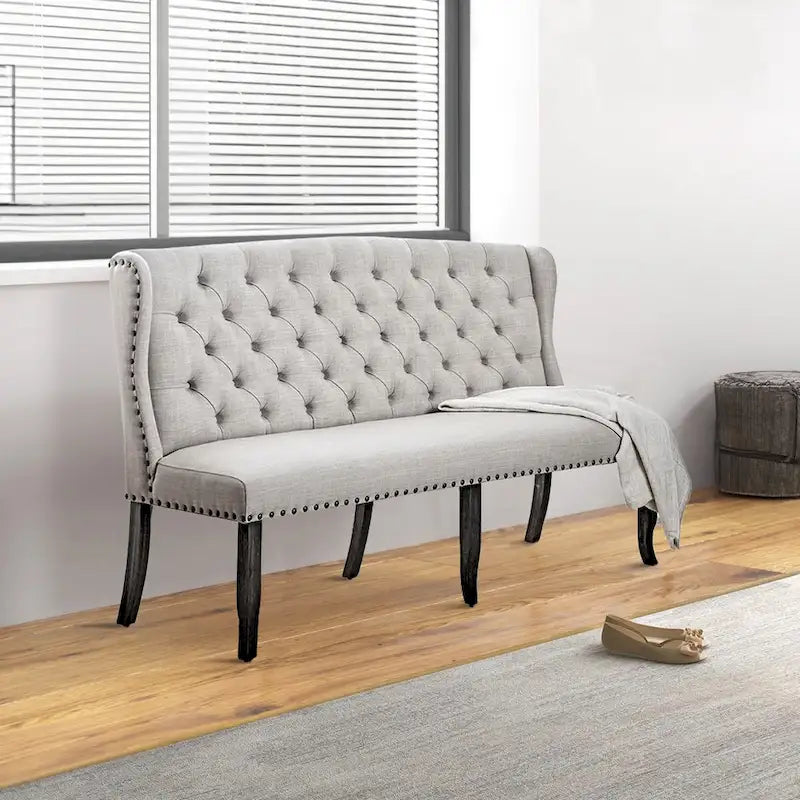 Banquette longue élégante avec dossier capitonné, couleur ivoire