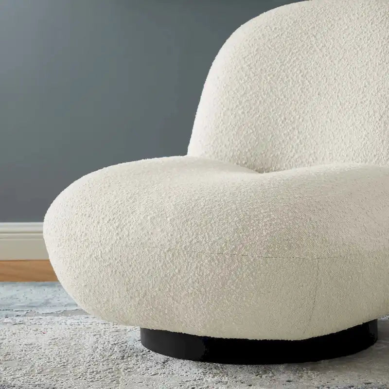 Fauteuil pivotant Kindred en bouclette avec piètement en métal noir mat