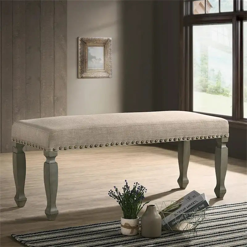 Banc rembourré avec clous décoratifs et cadre en bois