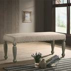 Banc rembourré avec clous décoratifs et cadre en bois