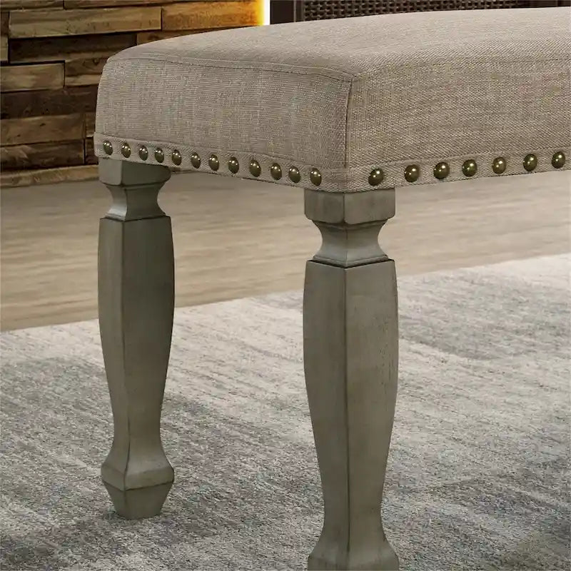 Banc rembourré avec clous décoratifs et cadre en bois