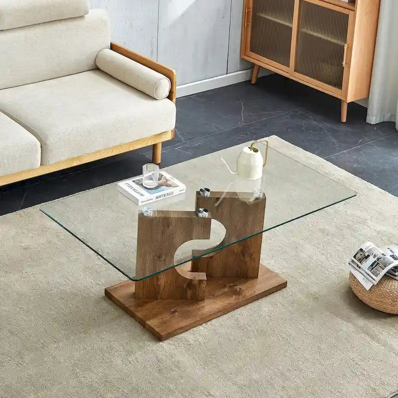 Une table basse rectangulaire moderne avec plateau en verre trempé et pieds en MDF couleur bois. Convient pour le salon.