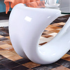 Table basse ovale moderne et abstraite avec plateau en verre et base en métal