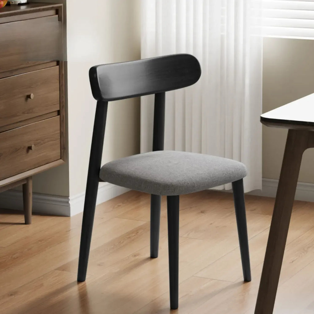 Chaise de salle à manger moderne en cuir sans accoudoirs avec dossier bas